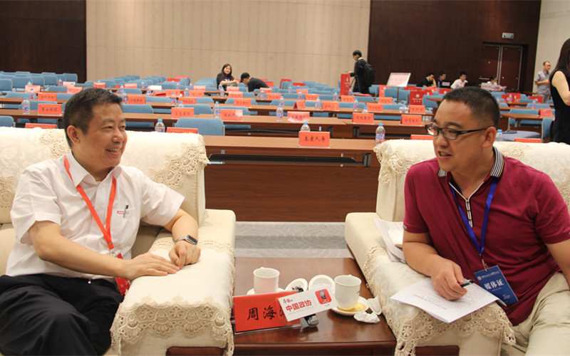 红豆为什么赢？看周氏三代从手工作坊到国际布局